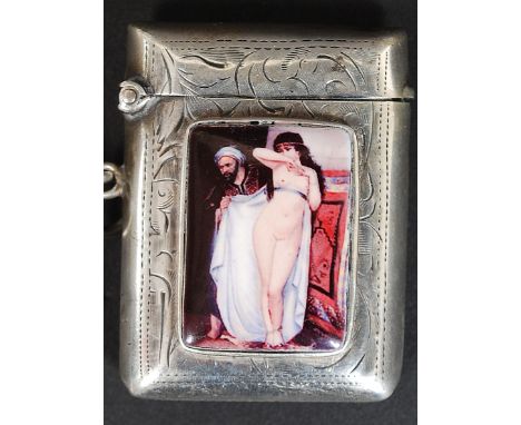 A  rococo chased silver hallmarked Victorian vesta case by J Collyer Ltd, , Birmingham hallmarks 1920, bearing an enamel styl