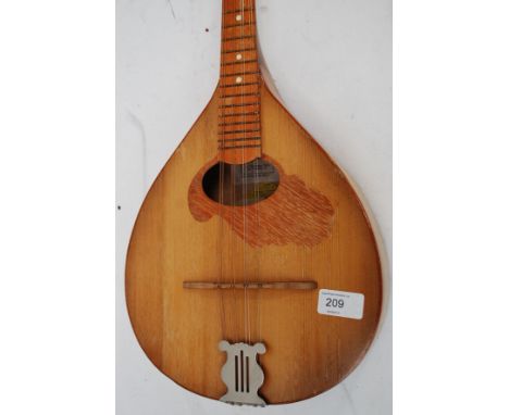 MUSICAL INSTRUMENTS: A vintage Russian made folk mandolin bearing makers label to interior  (see illustration). 

UK, Europea