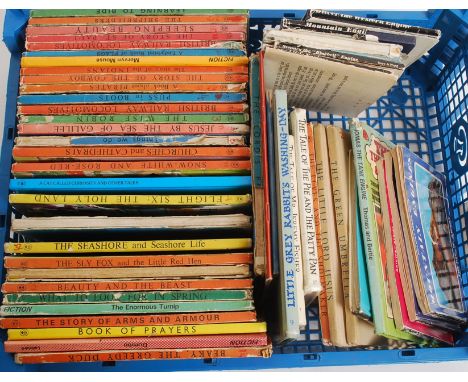A collection of vintage Ladybird books together with a collection of early Thomas the Tank Engine books and Beatrix Potter al