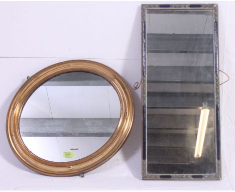 A good quality vintage brass circular early 20th century porthole style mirror together with another