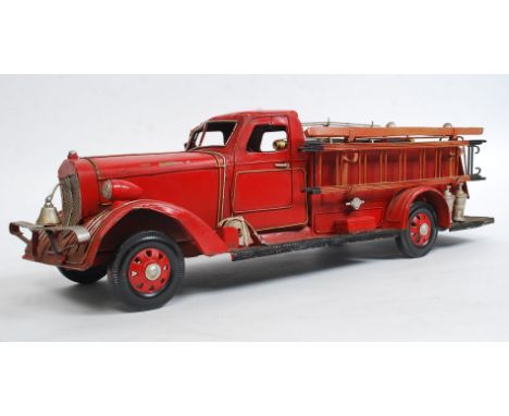 A 20th century tinplate model of a fire engine 56cm long