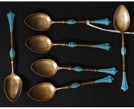A set of stunning Norway - Norwegian silver and champleve enamel set spoons. The stems and reverse bowls having stunning blue