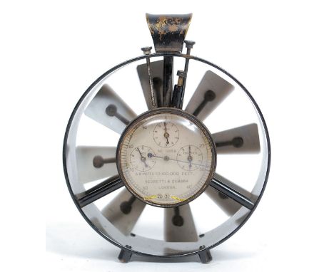 A Negretti & Zambra medium speed anemometer - air meter. The blackened brass frame with silvered dial having three subsidiary