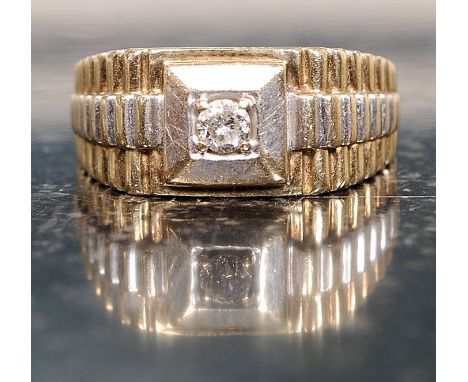 A large 9ct gold single stone diamond ring - gentlemans signet ring of unusual design. Total weight 6.6g, the stone approx 10