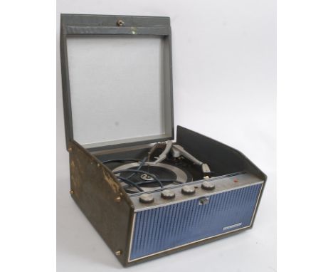 A vintage Ferguson record player with a Garrard deck. Within the original case. 
