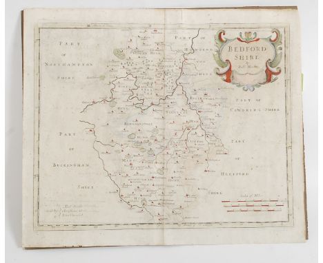 Morden R. : Bedfordshire, An engraved hand coloured cartouche showing regional boundaries and hand coloured detail being unfr