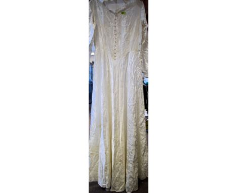 An Edwardian silk ivory white wedding dress in a simple Edwardian style with a pearl button up front ( approx plus size 18 )