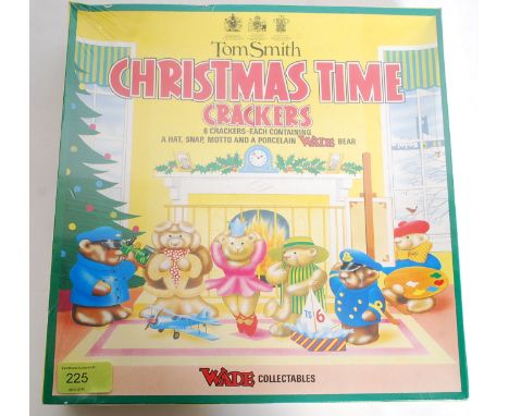 A box of unopened Tom Smiths Wade Christmas Time crackers, in original packaging, each cracker containing a Wade Wimsie