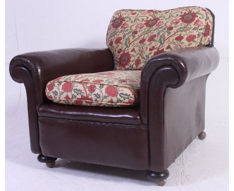 An excellent 1930's Art Deco leather Chesterfield club armchair, The frame upholstered in a good leather having tapestry Libe