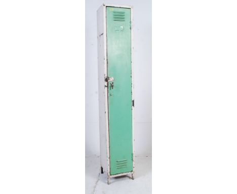 A vintage 1940's metal sentry box Industrial two tone locker. The white body with green painted door having vented upper. Mea