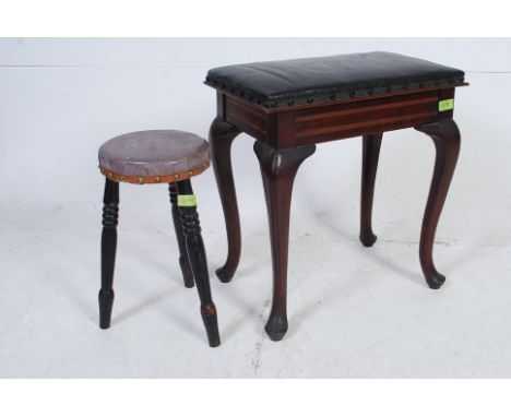 An Edwardian inlaid mahogany stool raised on cabriole legs with inlaid borders to the frieze having faux leather overstuffed 