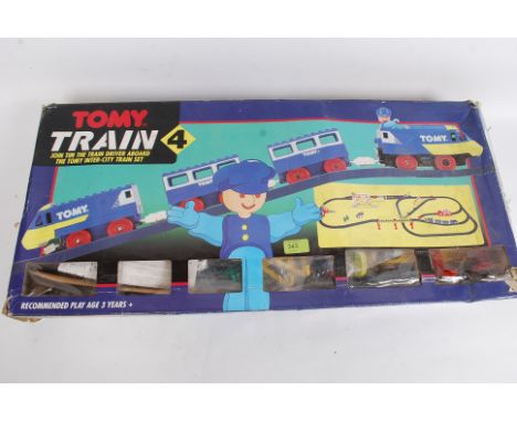 A retro 20th century vintage Tomy Train 4 games set complete in the original box