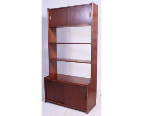 A vintage teak wood retro Danish style sideboard / room divider cabinet having lower base having sliding door cupboard with u