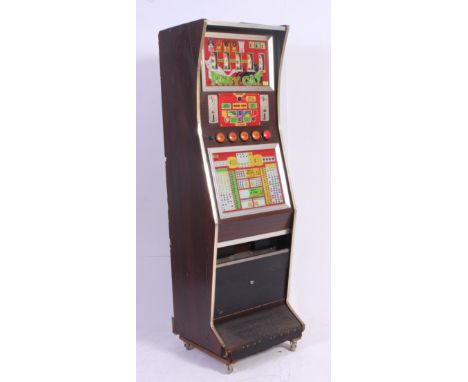 A vintage 1960's fruit machine having decorative facia within wooden upright body on castors. Together with a large collectio