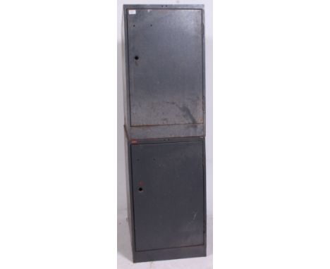 A set of 2 large factory industrial mid 20th cenutry  vintage Industrial lockers with internal shelves in grey finish. H76 x 