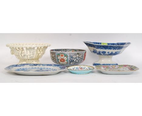 A collection of Chinese ceramics to include a blue and white raised tureen along with a Chinese fruit bowl, 2 meat platters a