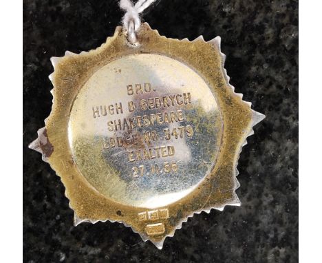 A gilded silver hallmarked and enamel masonic lodge badge with notation to verso for Brother Hugh B. Gebrych, Shakespeare Lod