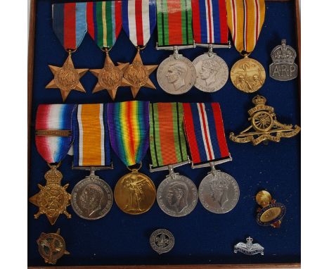 A WWI and WWII father and son medal group comprising medals awarded to 68954 Dvr A E Veale. RA. and sons second world war med