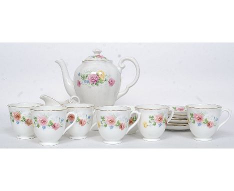 A Tuscan china vintage chintz pattern part tea service comprising cups, saucers, plates, teapot etc