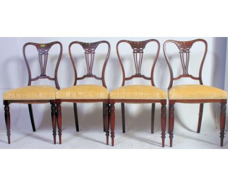 4 Victorian rosewood, mahogany and marquetry inlaid dining chairs. Raised on turned legs with ceramic castors, the chairs bea