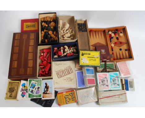 A good mixed lot to include vintage playing cards, to include Bob's your Uncle etc, bone chess pieces, etc please see images