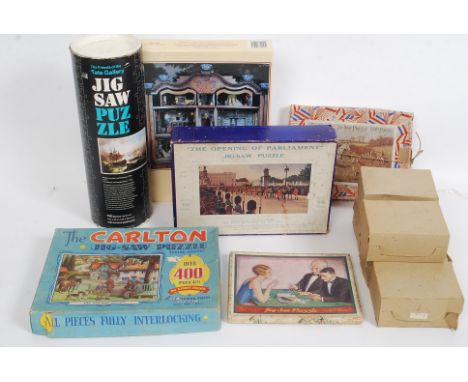 A collection of vintage Jigsaw puzzles to include Chad Valley, Nash and Hurd etc