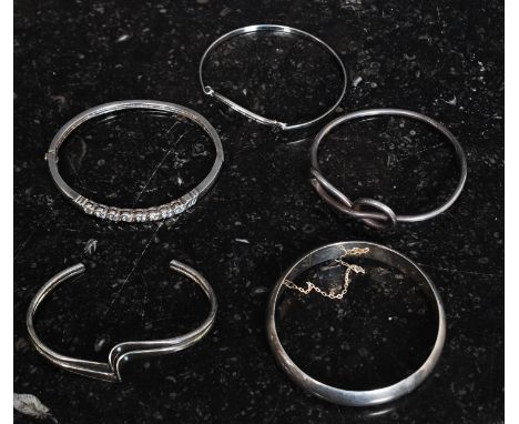 A collection of silver 925 / sterling ladies bangles / bracelets to include contemporary,channel stone set, swirl, vintage ba