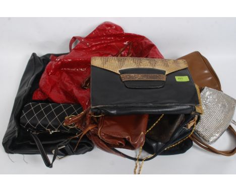 A vintage 20th century ladies leather and snakeskin clutch bag purse together with other 20th century ladies handbags to incl