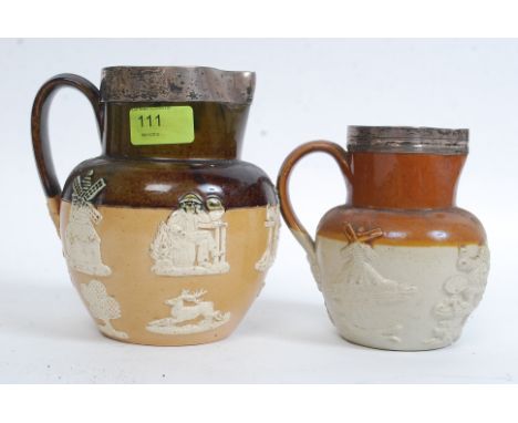 A 19th century Doulton Lambeth stoneware silver collar jug with hunting scenes together with another saltglaze jug with simil