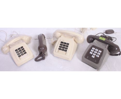 A pair of vintage 1970's retro BT push button cream telephones together with a similar finished in Grey