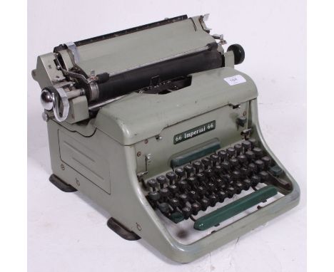 A vintage mid 20th century large Industrial Imperial typewriter in the original green enamel finish
