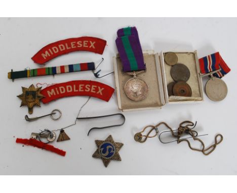 A Georve V service medal and ribbon awarded to 11848842 Gunner AE Hinkin, RA. Together with another George 5th medal and ribb