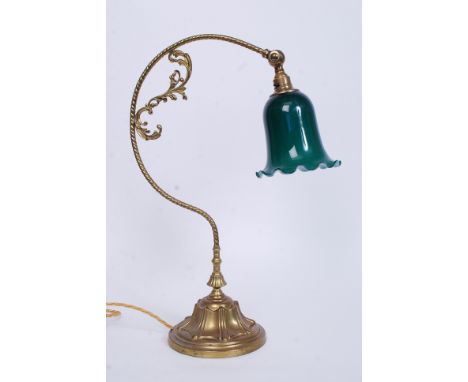 A stunning early 20th century brass vintage barleytwist swan neck desk lamp on a circular base fitted with a rich green penda