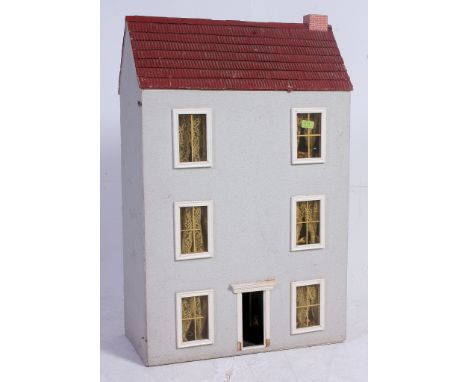 An old 20th century  vintage  dolls house having decorated interior ( see illustrations)  Measures: 98 x 64 x 33