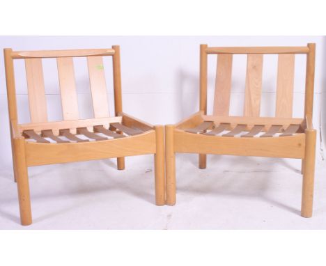 A pair of Ercol 741 staff / Industrial office chairs of beech construction ready for being re-upholstered Ercol Model 741. Me