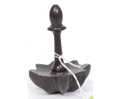 A late 18th century treen citrus press fruit squeezer having finial topped stem