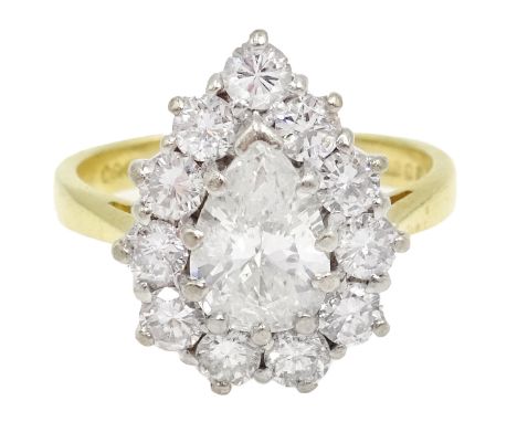 18ct gold diamond cluster ring, central pear shaped diamond surrounded by eleven round diamonds hallmarked, central pear appr