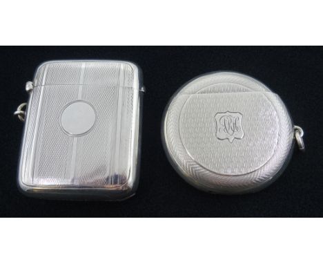 Edwardian silver circular vesta case, engine turned decoration by Rotherham & Sons, Birmingham 1905 and one other by William 