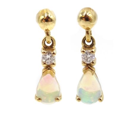 Pair of 9ct gold diamond and opal pendant earrings, stamped 375 Condition Report Length = 15mm Click here for further images,