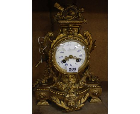 A French gilt meal mantel clock, enamel Roman numeral dial, 33cm high 