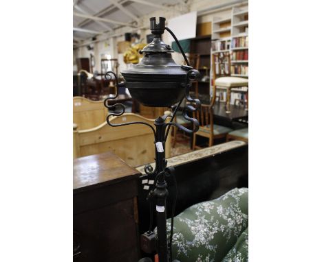 A wrought iron standard lamp (sold as parts) 