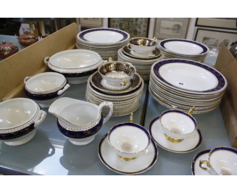 A Wedgwood & Co. 'Imperial Porcelain' part dinner service; fifty seven plates total, thirteen bowls, one small jug, one veg d