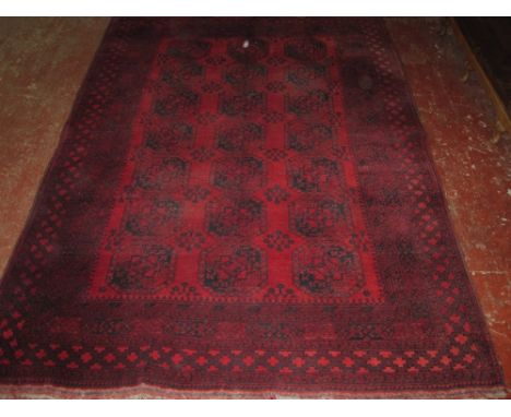 An Afghan carpet 302 x 214cm  
