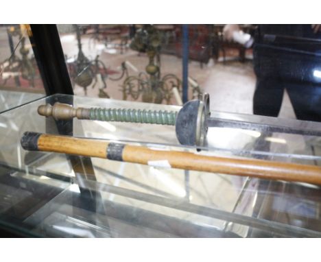 A silver mounted swagger stick, together with two fencing foils and a face guard. 