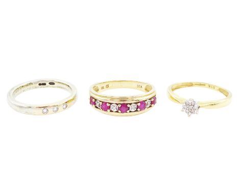 Gold three stone rubover set diamond ring, nine stone ruby and diamond ring and a diamond cluster ring, all hallmarked 9ctCon