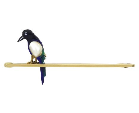 Early 20th century blister pearl and enamel magpie bar brooch, stamped 15ctCondition Report:Approx 3.4gm, magpie 26cm x 5mm, 