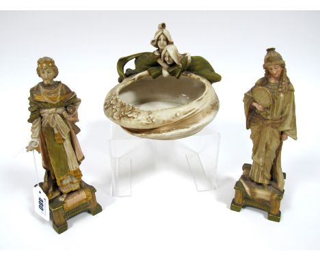 An Art Nouveau Royal Dux Porcelain Bowl, modelled as two ladies looking into floral decorated pond, pink triangle mark and sh
