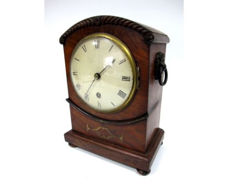 A Regency Mantel Clock, the associated four pillar movement with circular white enamel dial, indistinctly signed, Roman numer