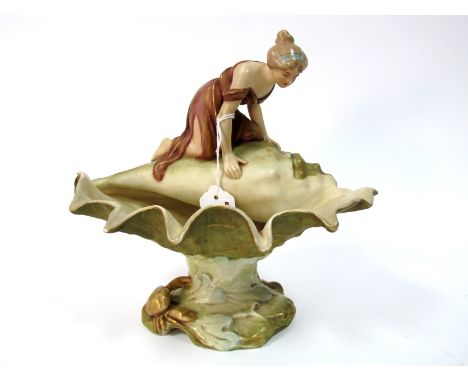 A Royal Dux Art Nouveau Porcelain Centrepiece Bowl, modelled as a maiden looking into a conch shell, a crab on the naturalist