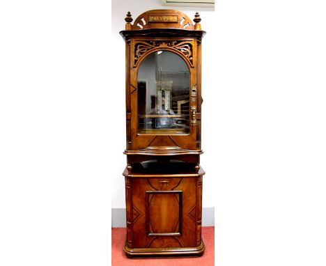 A Walnut Cased Cabinet Polyphon, with a coin operated mechanism playing 50cm discs, the case with a shaped cresting over a se